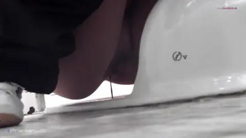 Girls Pissing in Bathroom