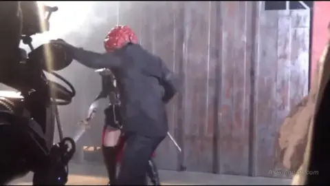 Asian Models in Leather Outfits Engage in Erotic Scenes