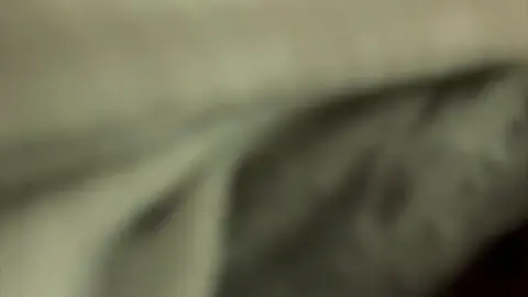 Intimate Bedroom Encounter with Black-Haired Couple