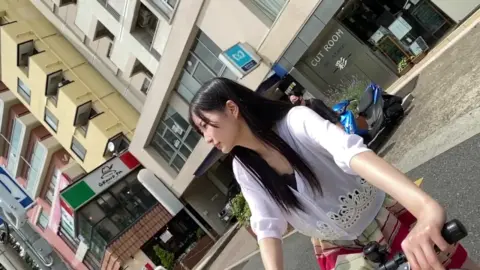 Asian Teen Upskirt on Street with Bicycle