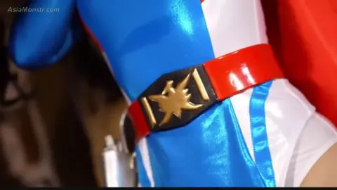 Asian Cosplay Erotica with Gun and Skirt