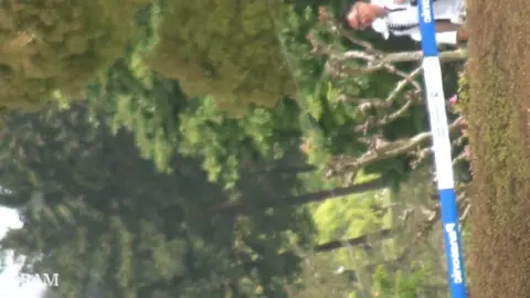 Redhead Golf Scene with Caucasian Couple