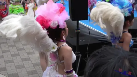 Asian Dancers in Colorful Costumes