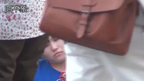 Asian Men and Women in Outdoor Setting