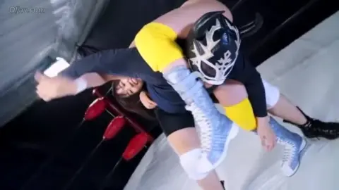 Asian Women Wrestling in Ring