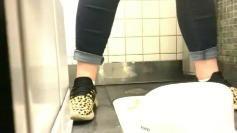 POV Bathroom Urination Scenes with Asian and Caucasian Performers