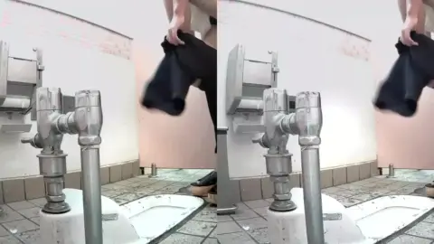 Asian Girl Urinating in Bathroom