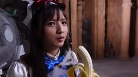 Asian Cosplayer in Various Settings