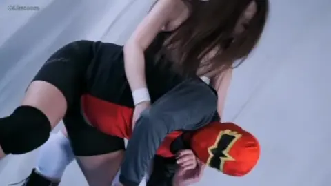 Asian Women Wrestling in Ring