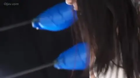 Asian Lesbian Intimacy in Dark Room