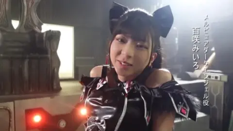 Black-Haired Beauty in Cat Costume