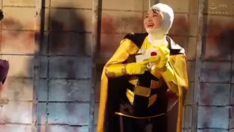 Asian Cosplay Tease in Industrial Setting