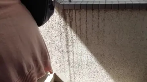 Asian Teen with Red Bow Tie on Train and Stairwell