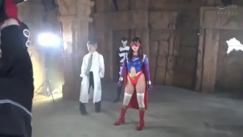 Asian Performers in Costumes Posing