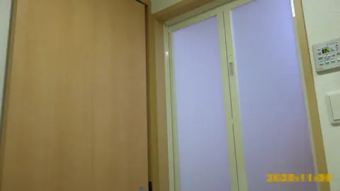 Asian Girl Undressing in Bathroom