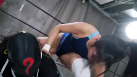Asian Wrestlers Engage in Fierce Matches