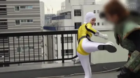 Asian Cosplay Models Posing on Rooftop