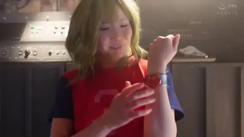 Woman in Red Cape Smiling