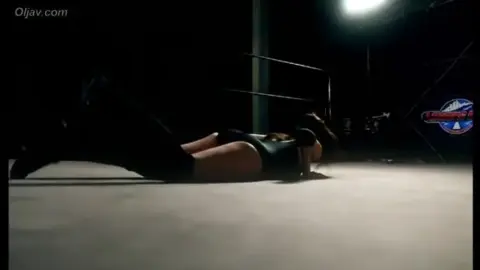 Asian Women Wrestling in Ring