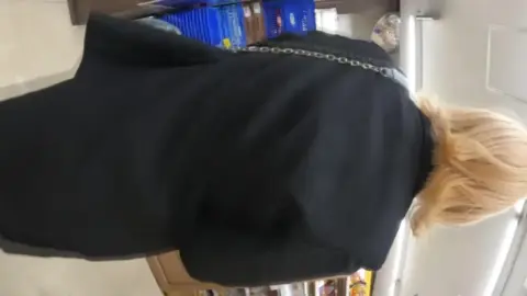 Blonde Asian Woman Exposes Breasts in Convenience Store