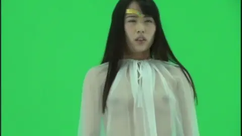 Asian Cosplay Duo in Costumes Pose and Embrace