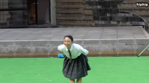 Asian Teen Girls in Skirts Outdoor Dance