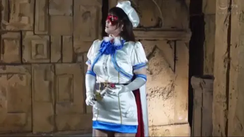 Asian Cosplay Erotica with Red Mask and White Costume