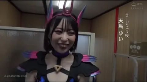 Asian Women in Futuristic Outfits