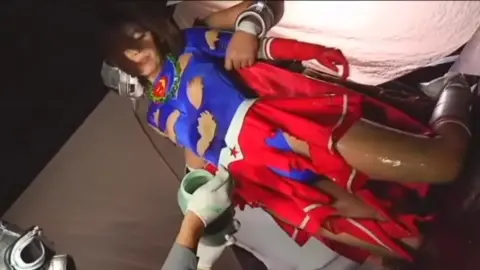 Asian Wrestlers in Laboratory Restraint
