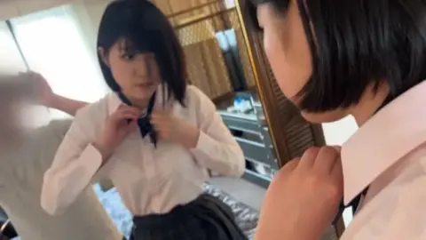 Asian Lesbian Couple Intimacy in Bedroom