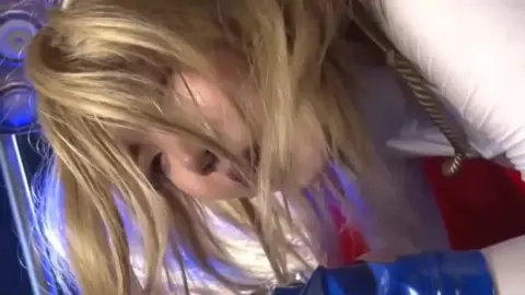 Asian Couple Intimate Moments in Blue Lighting