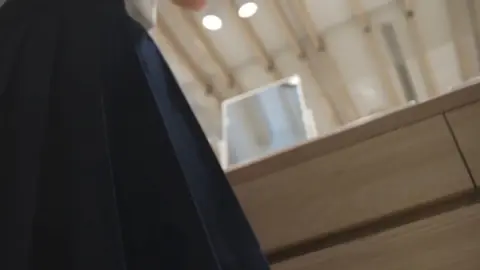 Asian Teen Lifts Skirt on Staircase