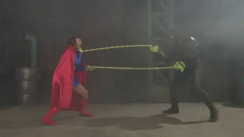 Asian Superhero Bondage Scene