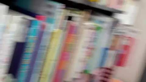 Asian Girl Seduces in Bookstore