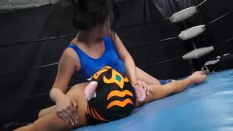 Asian Couple Engaged in Wrestling Match