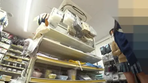 Asian Schoolgirls in Upskirt Moments at Store
