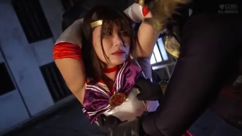 Asian Woman in Industrial Setting Bondage Scene