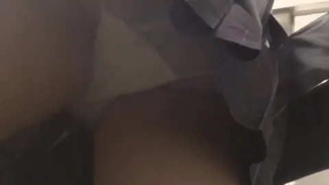 Asian Woman in Dark Clothing