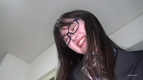 Asian girl with 3 men in intimate indoor scene