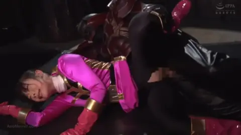Asian Couple in Pink and Gold Costume BDSM Scene