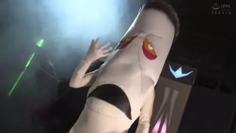 Asian Women in Costumes on Stage