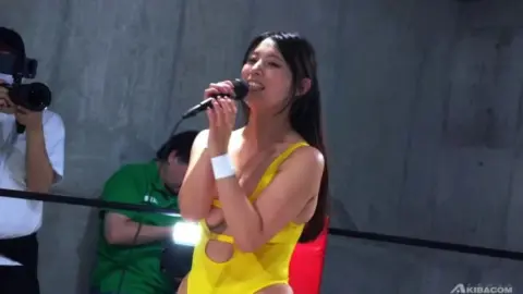 Asian Wrestlers in Intense Ring Match