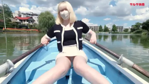 Blonde Asian Woman on Boat