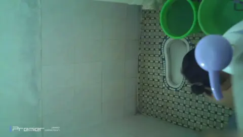 Asian Man in Bathroom Shower