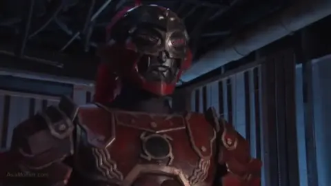 Asian Performer in Pink Costume with Robot