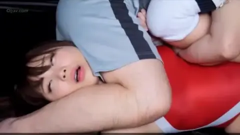 Asian Couple Wrestling in Dark Ring