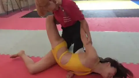 Asian Wrestlers in Yellow Bodysuits