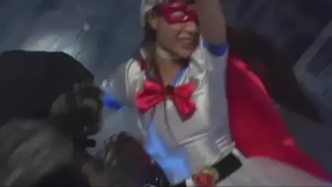 Asian Performer in Costume Restraint Scenes