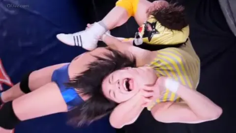 Asian Lesbians Wrestling in Leotards
