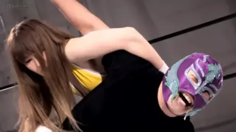 Asian Women Wrestling in Ring